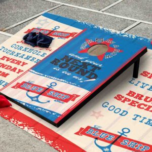 American flag themed corn hole game board with bean bags on the ground, in a backyard game scene with space for text